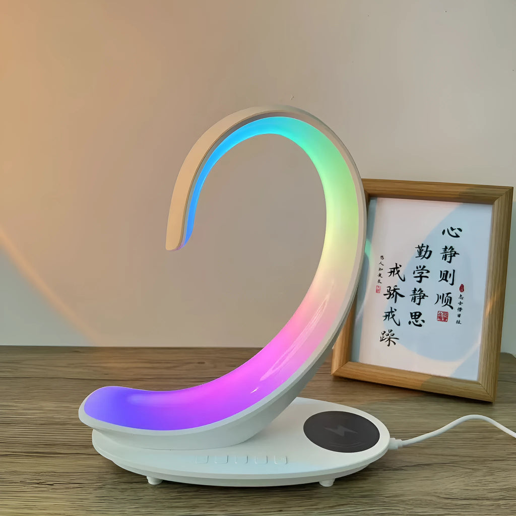 White Swan animal figure desktop wireless charger with Bluetooth speaker and colourful atmosphere light.