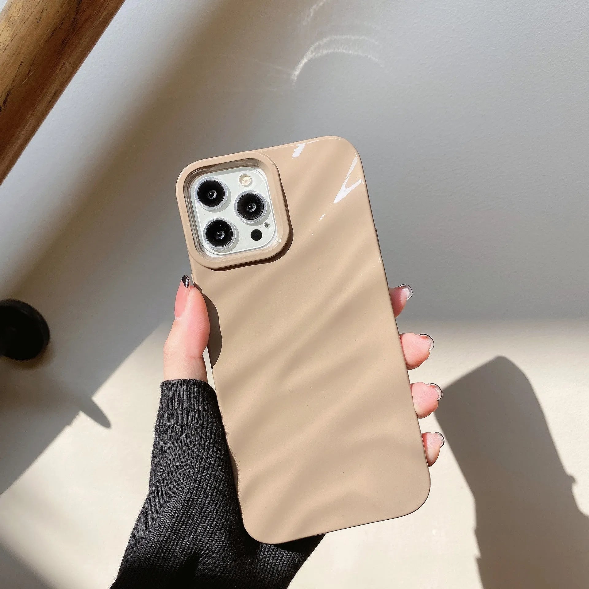 Soft wave pleated TPU phone case for Apple iPhone 17 in a selection of colours including electroplated gold and matte purple.
