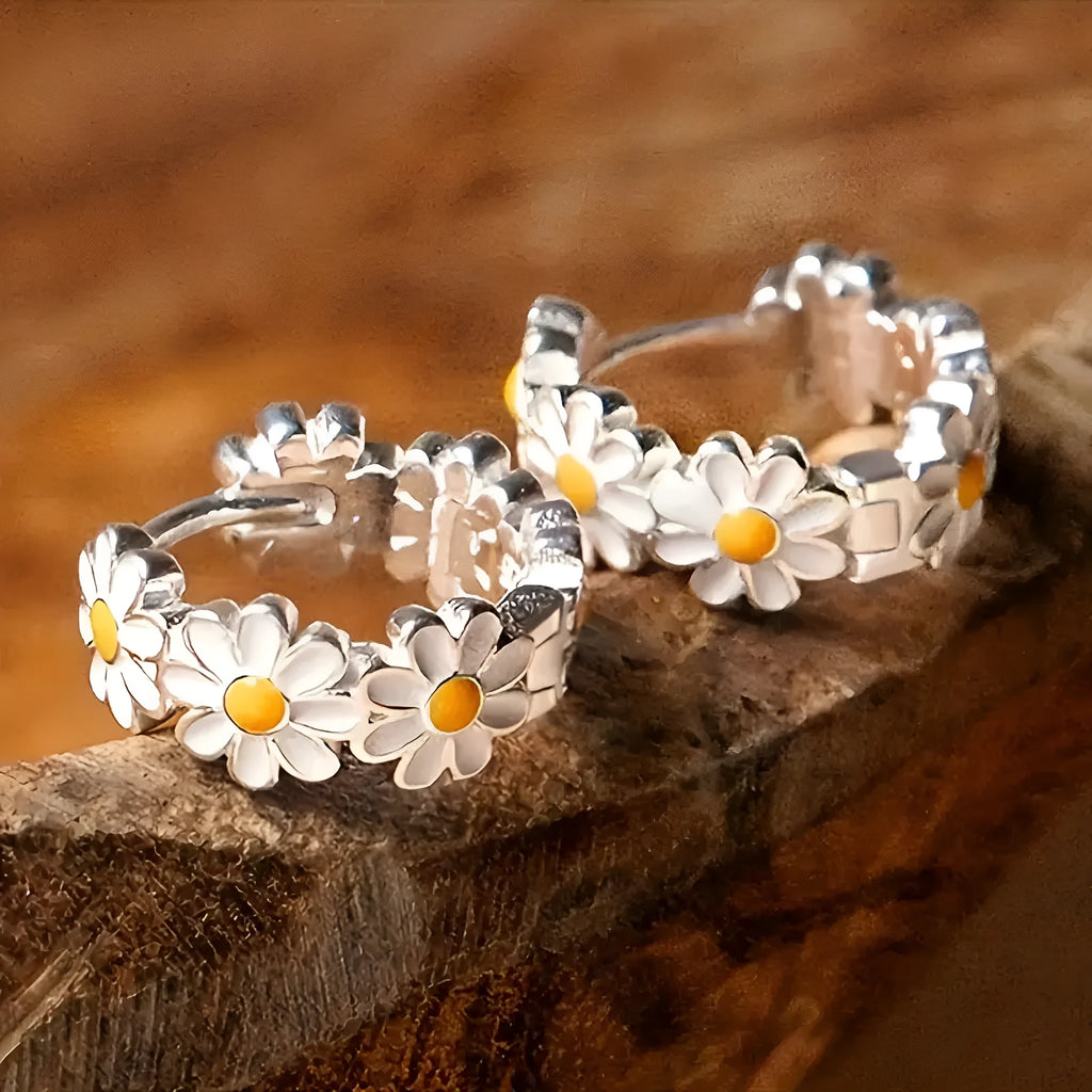 White daisy flower fashion ring earrings with electroplated finish and gemstone details.