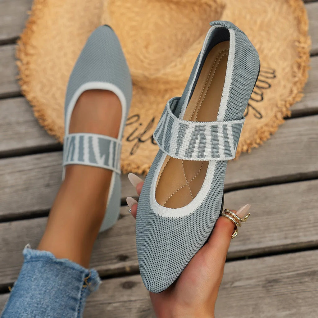 Women's pointed toe flat loafers in mesh upper with rubber sole, side view