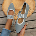 Women's pointed toe flat loafers in mesh upper with rubber sole, side view