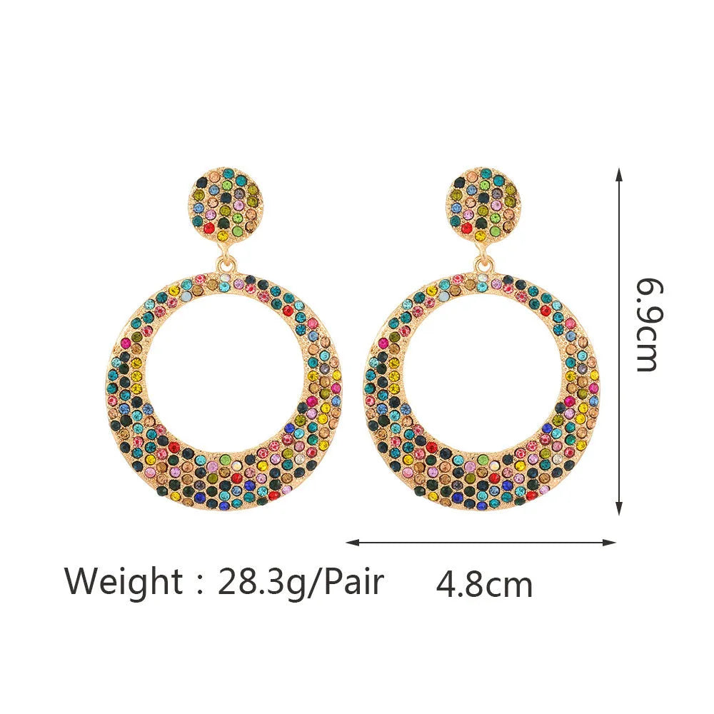 Large round pendant alloy earrings with colourful diamond cartoon design on a white background.