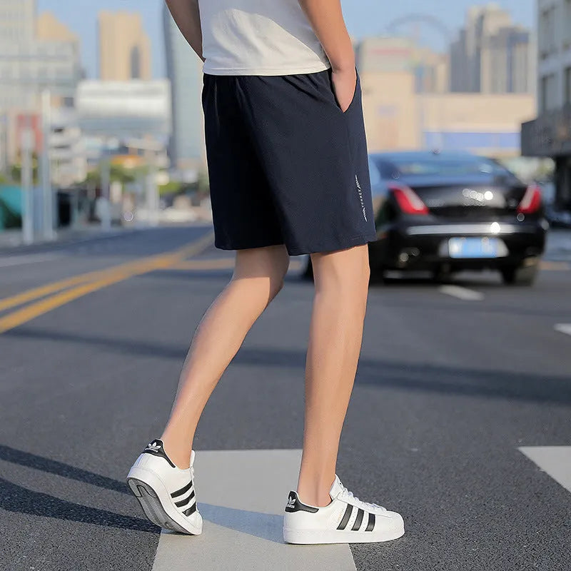 Men's cotton sports shorts in grey, black, or blue, five-point style, sizes L to 10XL, quick-drying.