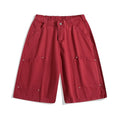 Cropped workwear pants in wide-leg design showing apricot, red, and army green colour options
