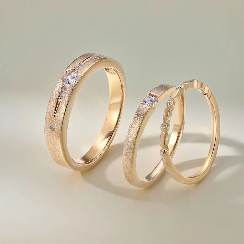 Sterling silver couple ring with geometric round diamond inlay in white gold finish on neutral background