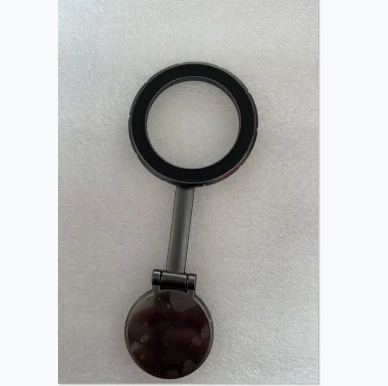 All-metal foldable magnetic car phone mount in Qian colour on a car dashboard.
