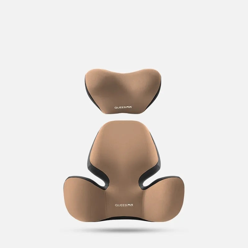 Black and grey memory foam car seat lumbar support pillow and headrest on a car seat.