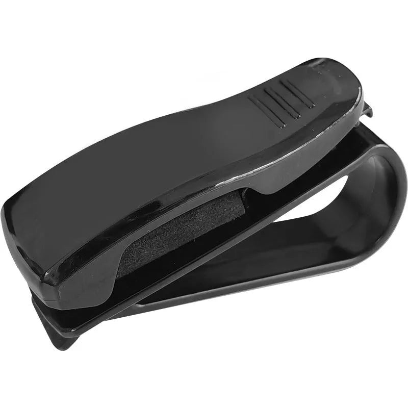 Black plastic car sunshade clip holder for glasses frames and cards measuring 6.5 by 2.3 centimetres