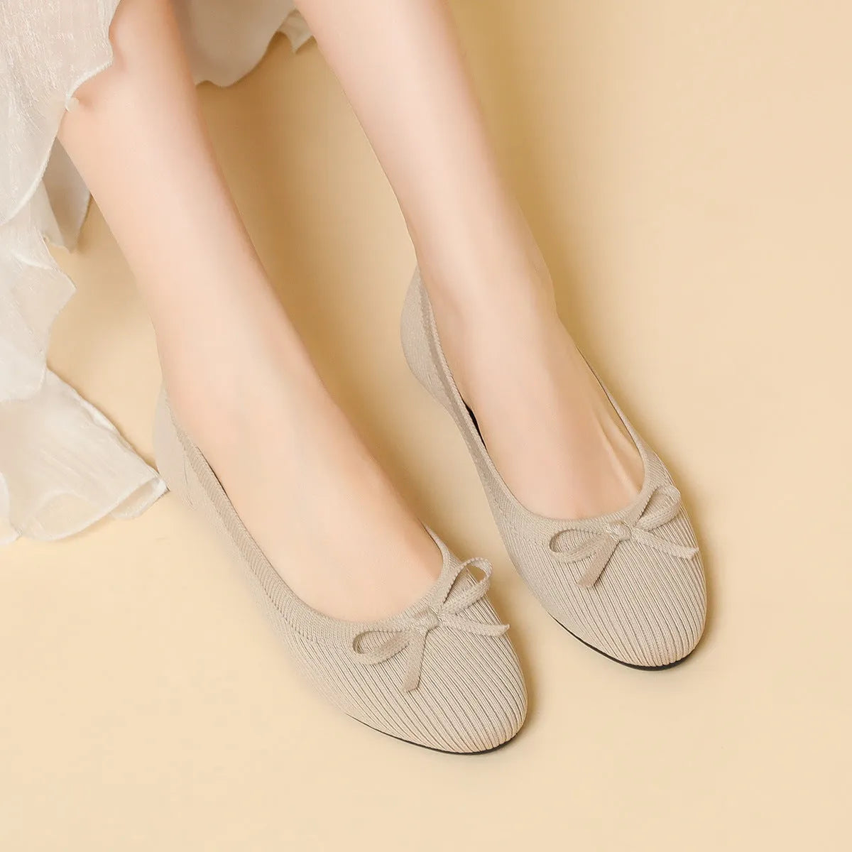Women's round toe fabric bow flat pumps in butterfly black colour with shallow mouth and oversleeve style