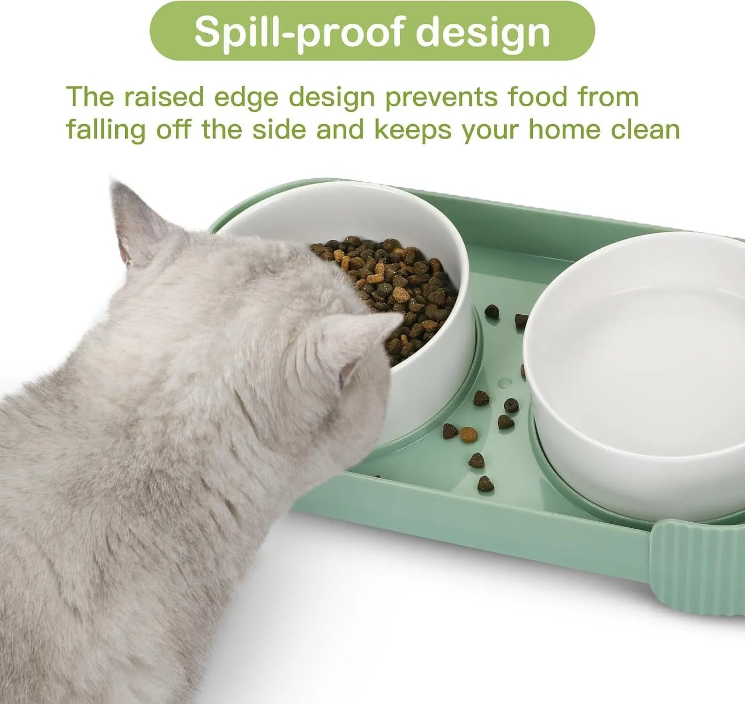 Green ceramic raised cat bowl set with two bowls on a tilted stand, showing non-slip base.