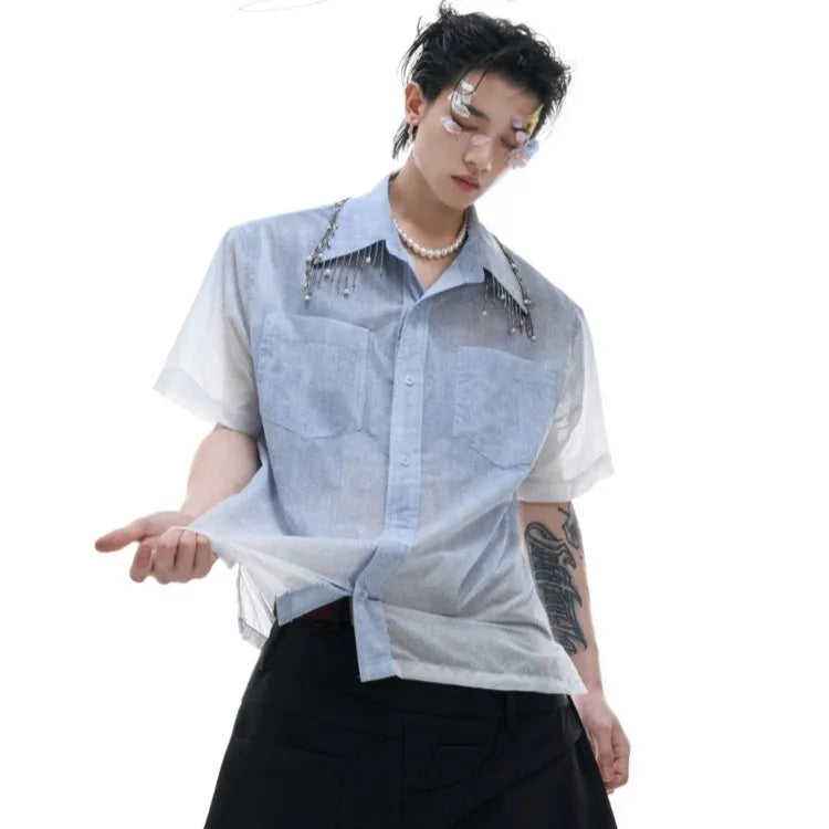 Man's blue and white gradient loose-fitting short sleeve casual shirt on a hanger