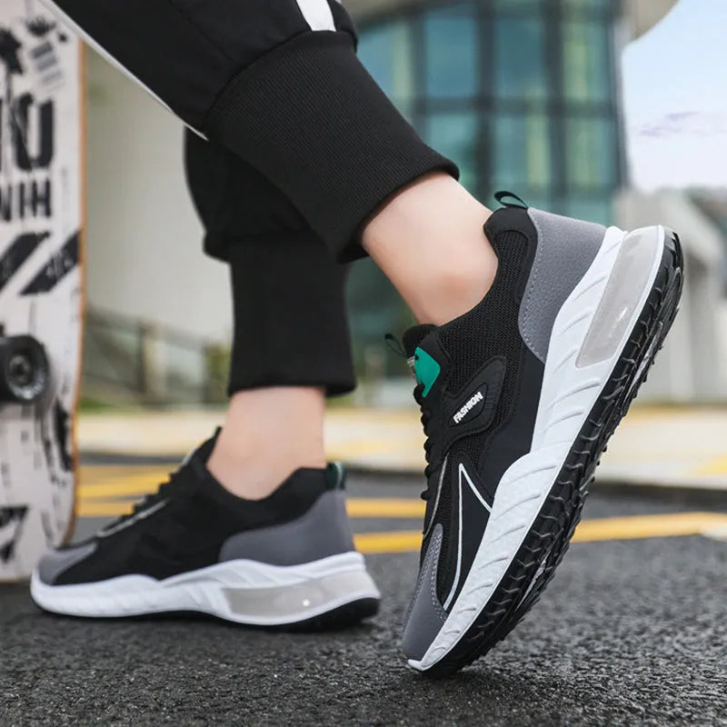 Colour-blocked men's mesh trainers with rubber sole, front lace-up, flat heel, round toe, in Black Green, Black Orange, or Grey Orange.