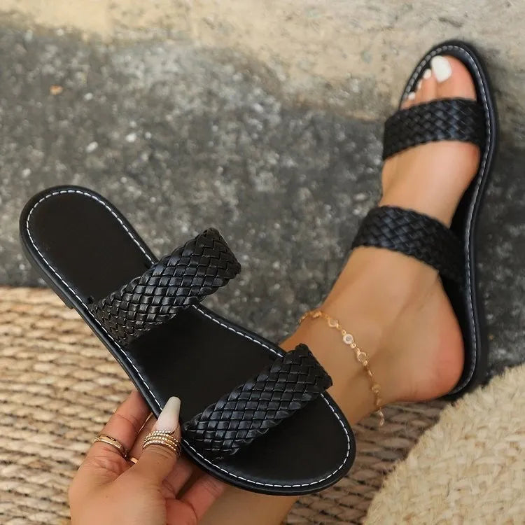 Women's plus size woven beach slippers in synthetic leather with PVC soles available in multiple colours