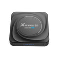 Set-top dual-band WiFi Bluetooth TV box with remote control and HDMI cable on table