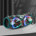 War Drum portable Bluetooth speaker with coloured LED lights in a black finish, showing carrying strap and control buttons.