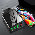 Digital display travel charger with three USB ports and interchangeable EU UK US plugs in black
