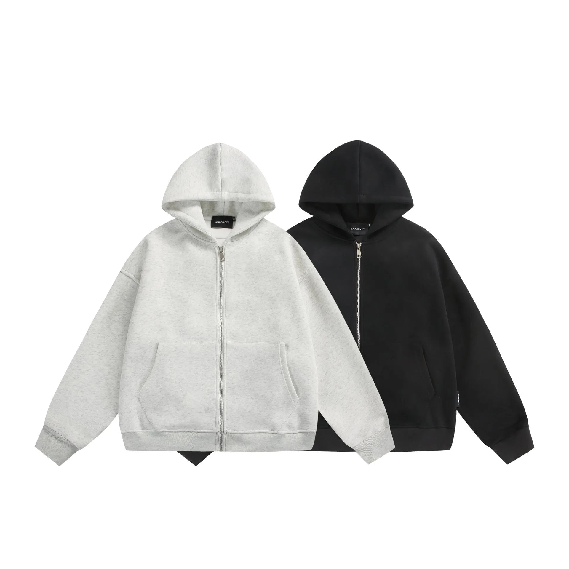 Loose fit cotton blend cardigan coat in black or melange grey with solid colour back and small bag design