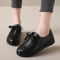 Women's work shoes in colour 6018 Black with round toe, front lacing, and anti-slip sole