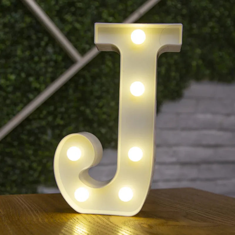 White plastic LED marquee letter sign with warm white glow, 22cm tall