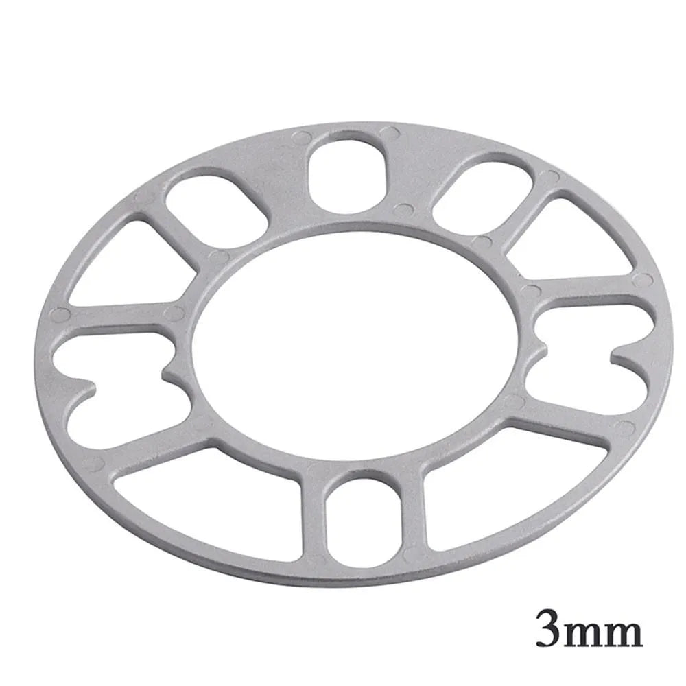 Set of four automotive wheel hub spacer gaskets showing different thicknesses of 3mm, 5mm, 8mm, and 10mm.