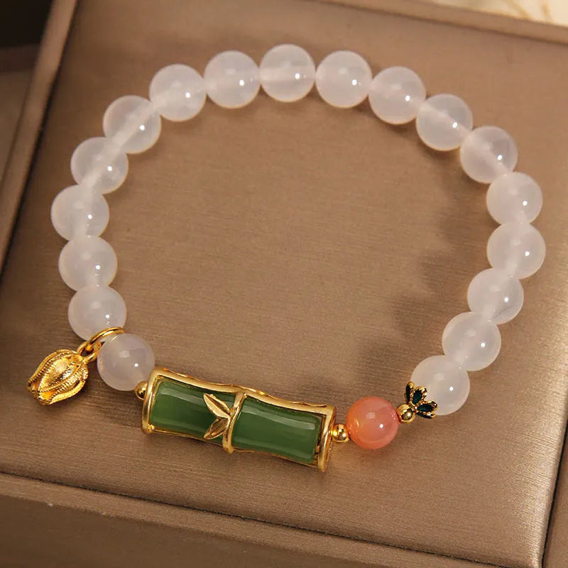 Chinese style bamboo beaded bracelet for women in white agate and jade with retro design