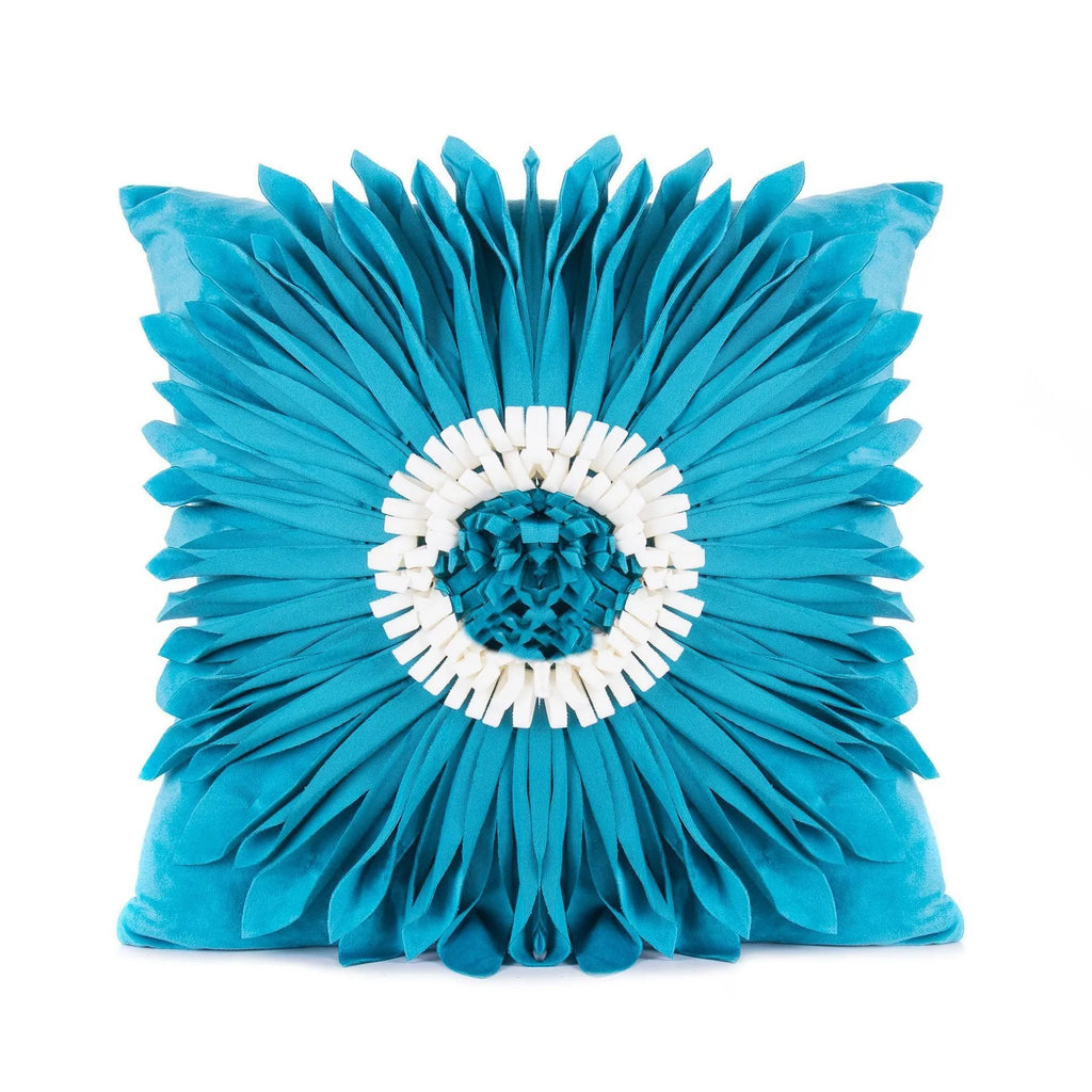 White polyester velvet cushion cover with blue chrysanthemum tufting pattern and fringed hem on a sofa