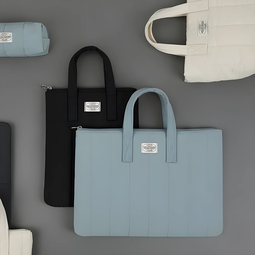 Personalised polyester laptop briefcase in black, shown next to matcha and sky blue colour options.