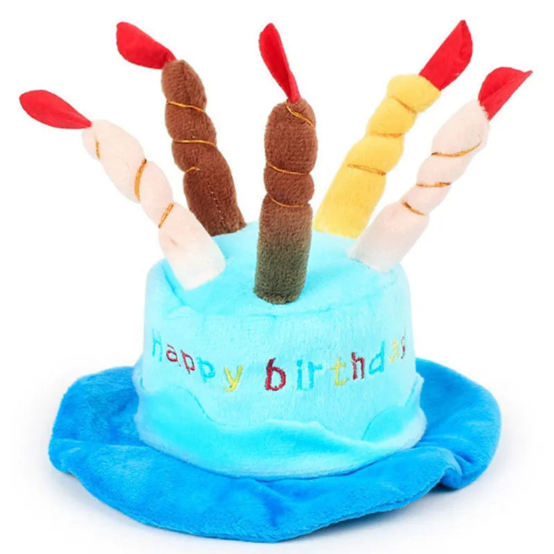 Blue pointed birthday hat for a small dog on a neutral background