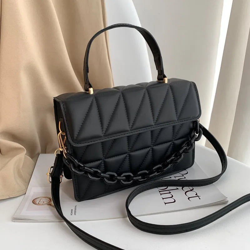 Casual small square PU shoulder messenger bag in black on a white background