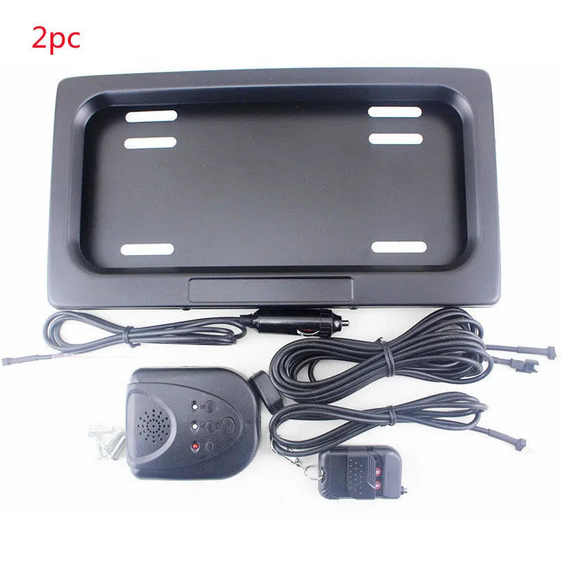 Black flipping license plate frame, 314 x 169 mm, for U.S. license plate size, iron and plastic construction.