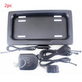 Black flipping license plate frame, 314 x 169 mm, for U.S. license plate size, iron and plastic construction.