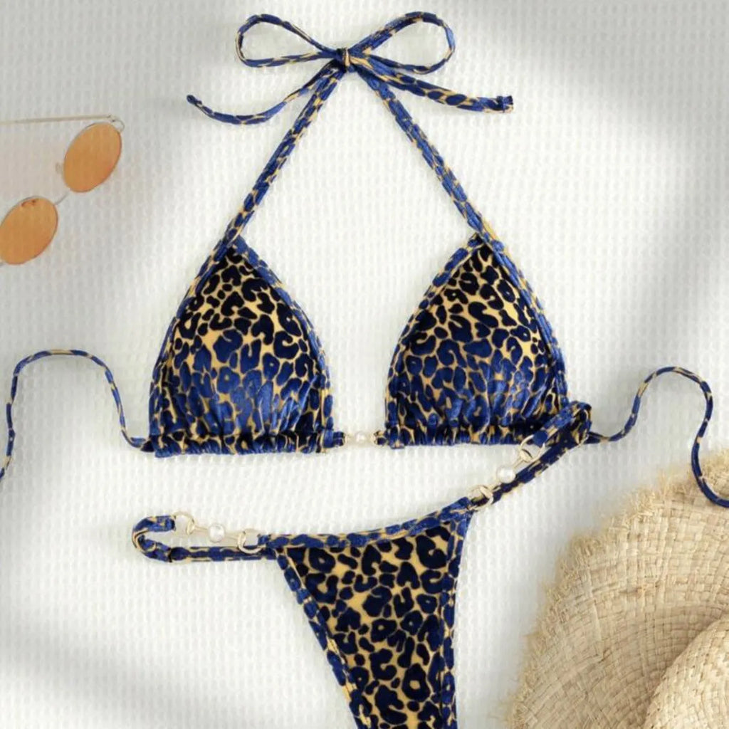 Blue leopard print women's swimsuit bikini set on a mannequin.