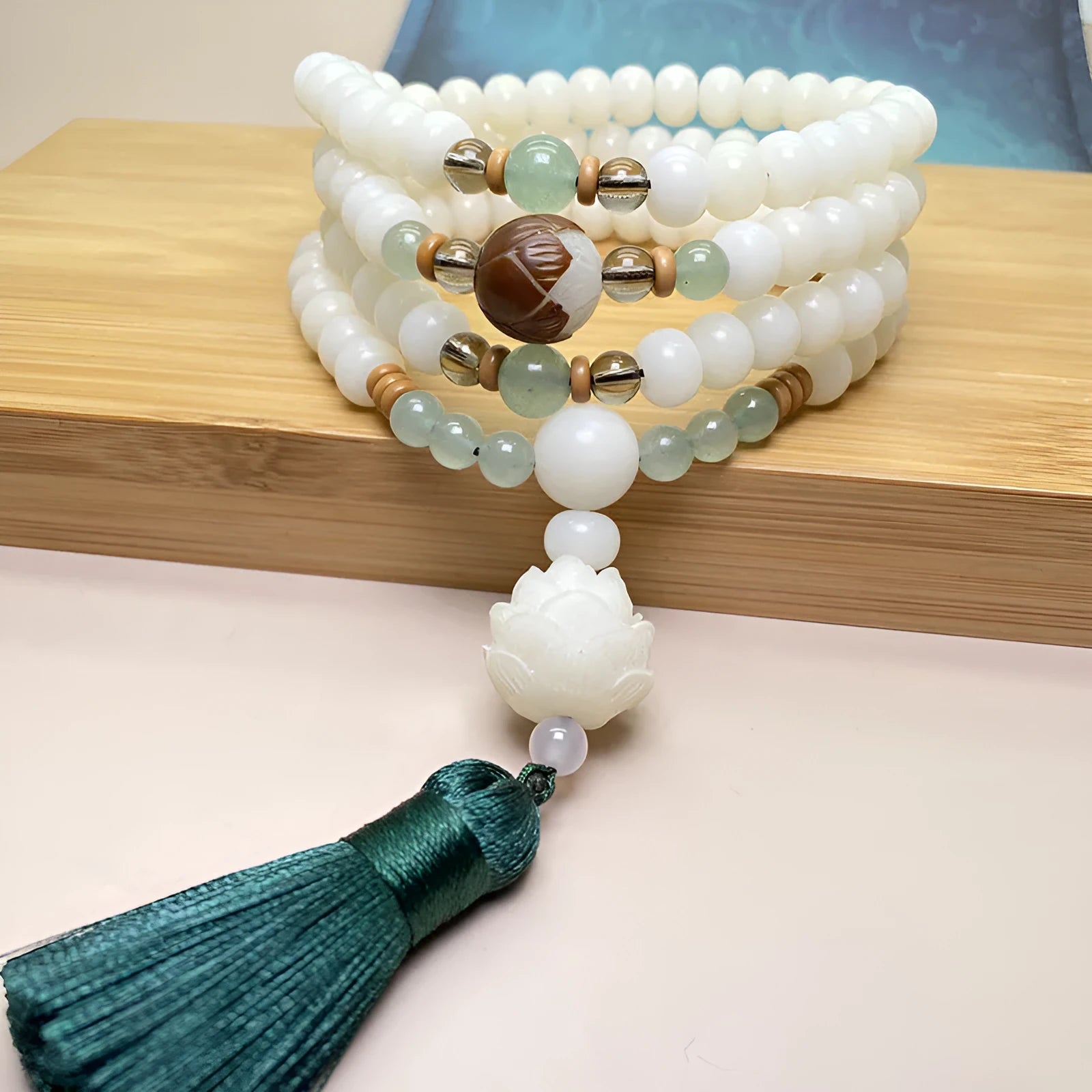 White Jade Bodhi beaded bracelet with 108 beads, showing different style and size options.