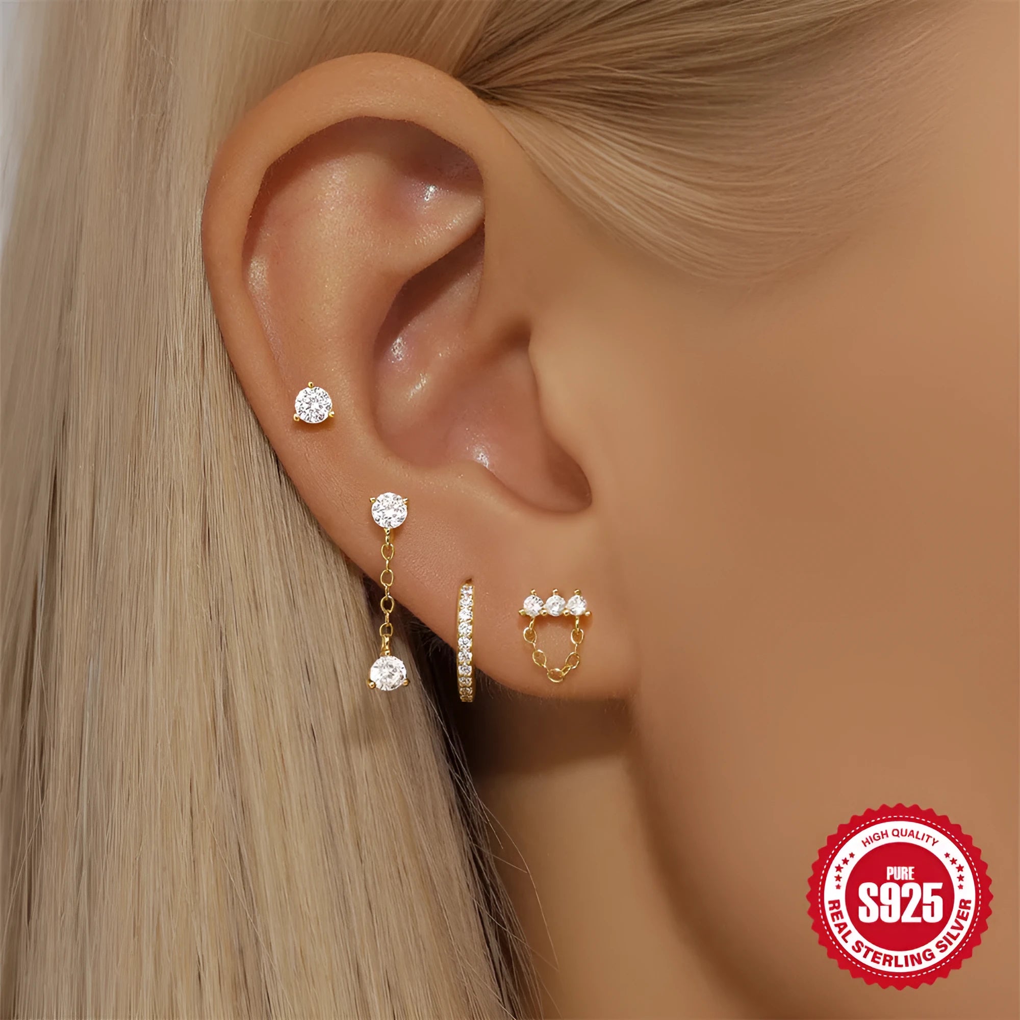 Geometric clover petal women's earrings in gold-tone electroplated S925 sterling silver on a white background.