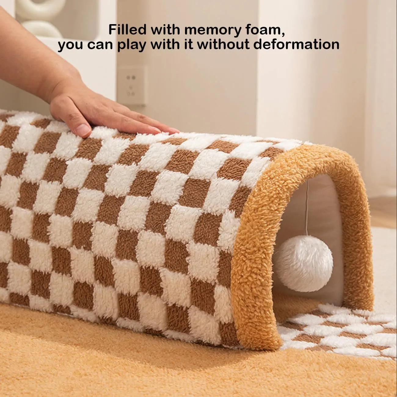 Fan-shaped plush pet bed for dogs and cats with a central tunnel, shown in a yellow colour.
