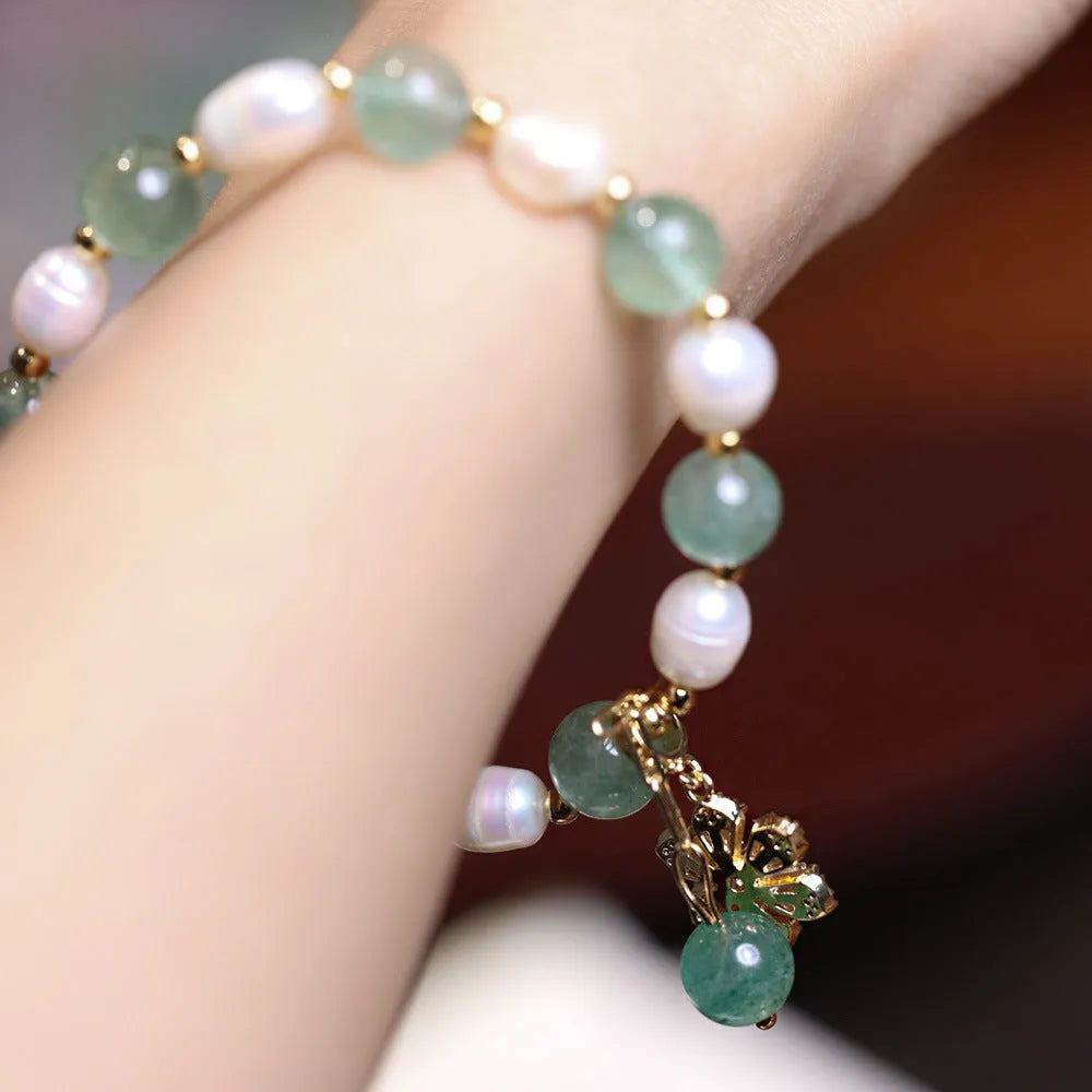 Green strawberry freshwater pearl bracelet with Chinese knot and peace buckle design
