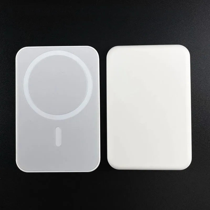White wireless power bank with magnetic charging surface showing 5000mAh capacity label