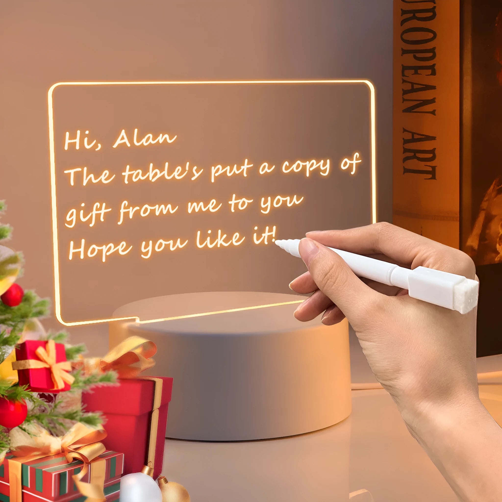 Heart-shaped LED light note board with USB warm yellow illumination on a desk