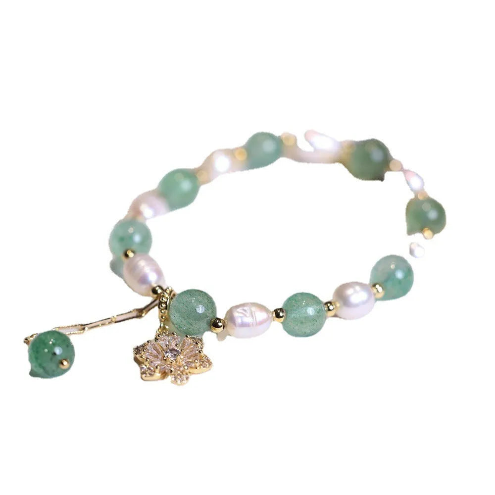 Green strawberry freshwater pearl bracelet with Chinese knot and peace buckle design