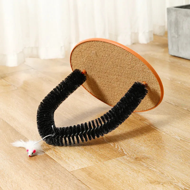 Black arch-shaped plastic cat grooming device with a mop and scratching surfaces, featuring a plush mouse toy.