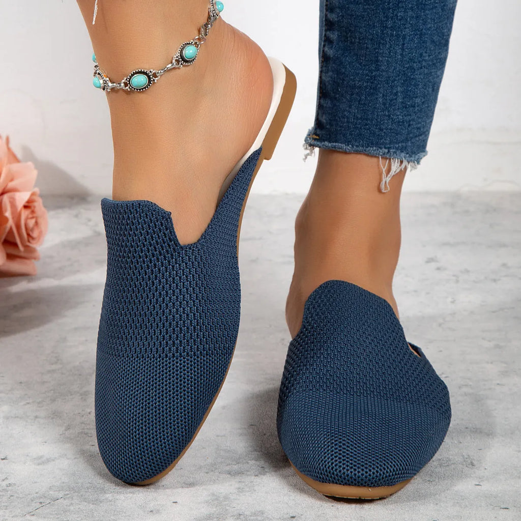 Women's apricot coloured cloth mesh slip-on sandals with a flat rubber sole on a white background.