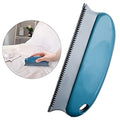 Dark blue pet hair remover brush with double serrated comb on a car seat