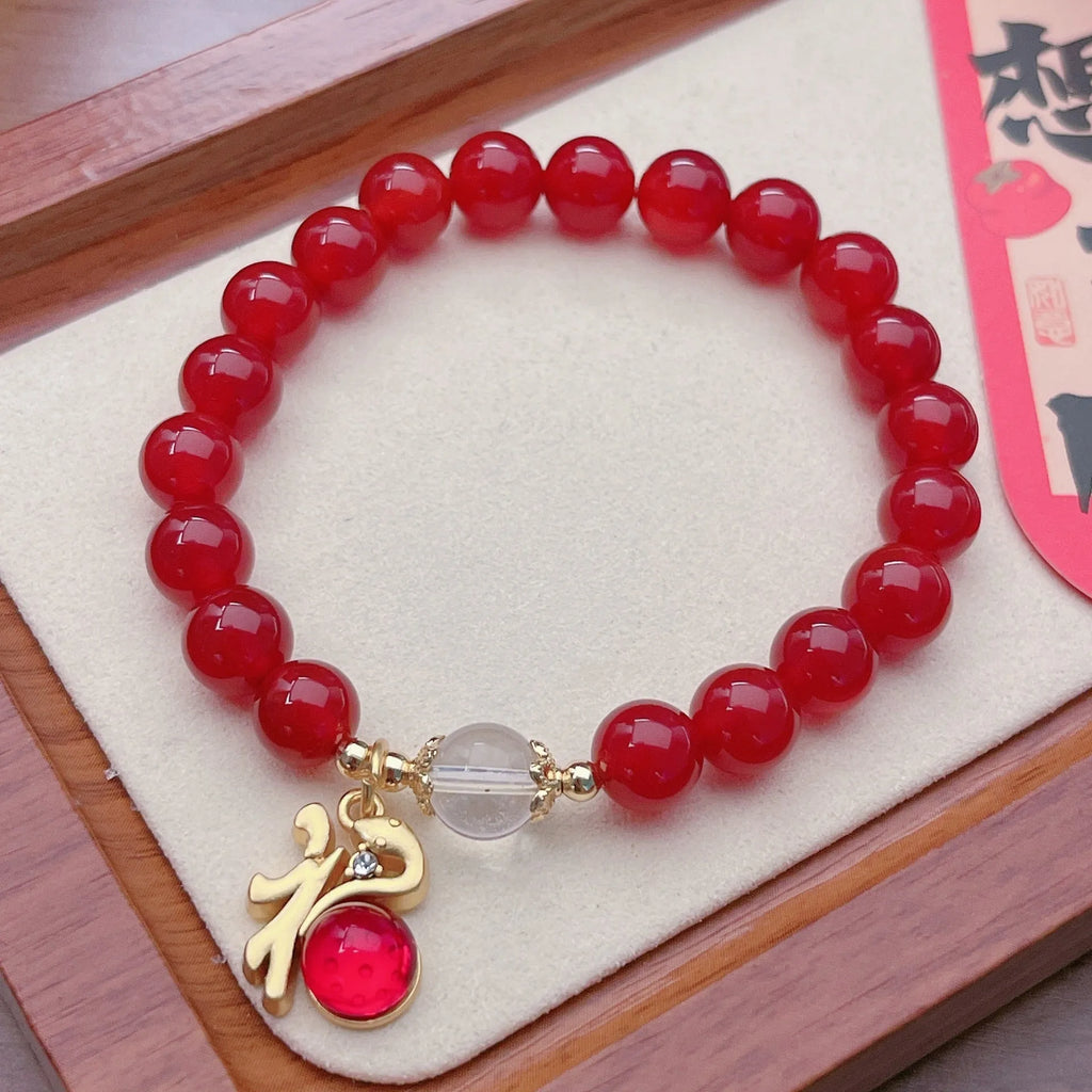 Handmade red agate bracelet with dragon design for women, Chinese style.