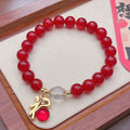Handmade red agate bracelet with dragon design for women, Chinese style.