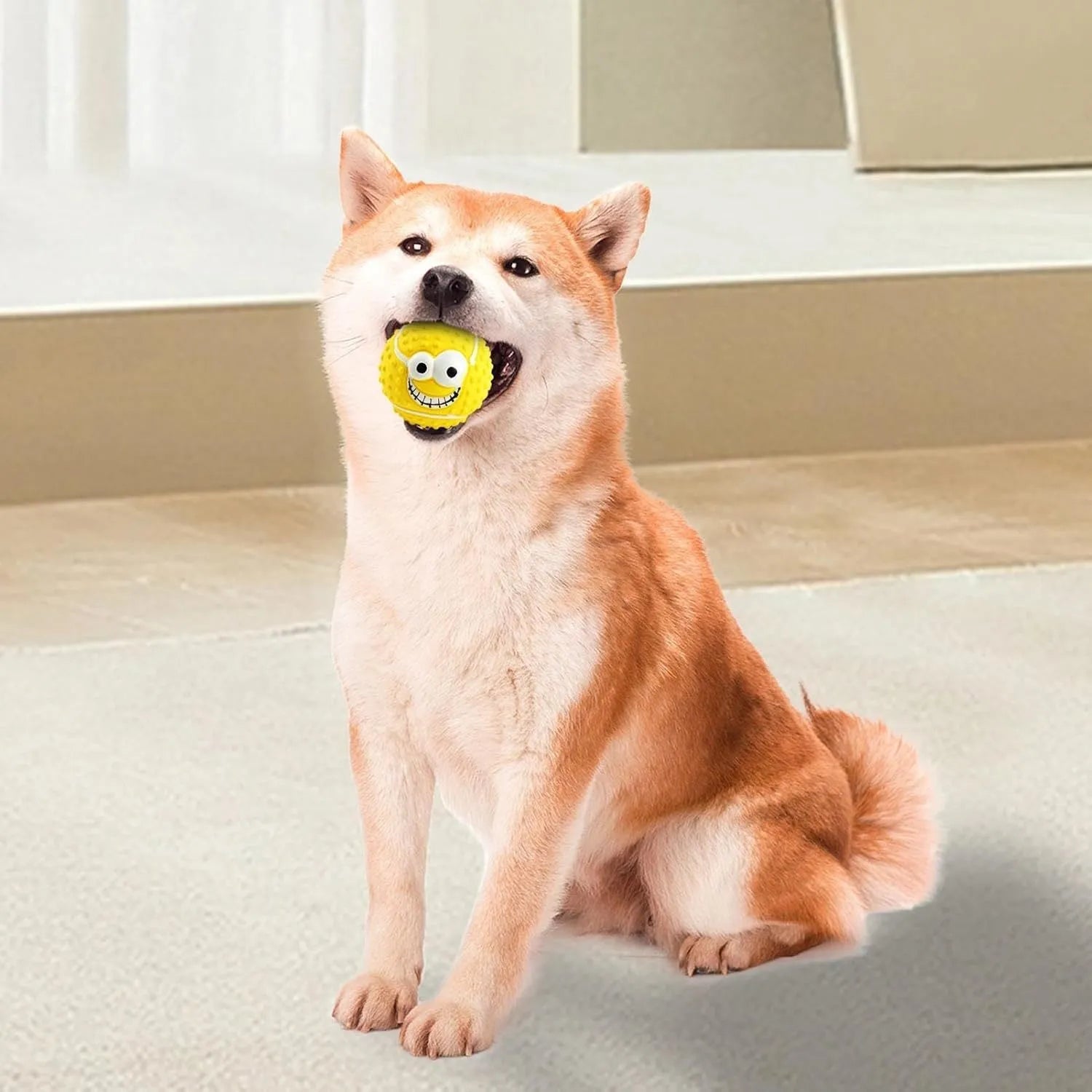 Green, orange, and yellow latex dog balls with smile faces, suitable for small to medium dogs