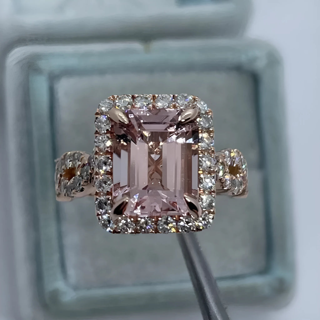 Rose gold coloured geometric alloy ring showing electroplated finish and angular design details