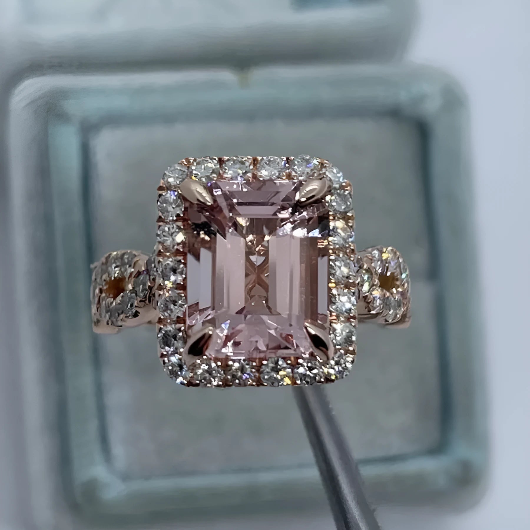 Rose gold coloured geometric alloy ring showing electroplated finish and angular design details
