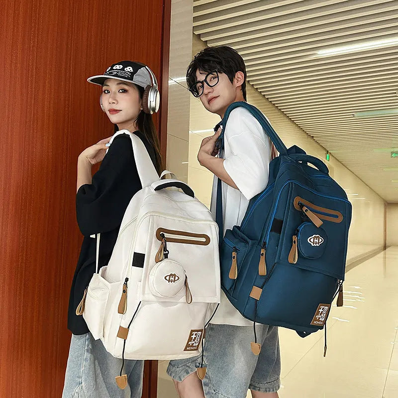 Waterproof nylon leisure travel backpack in multiple colours with 20-35L capacity and contrast stitching