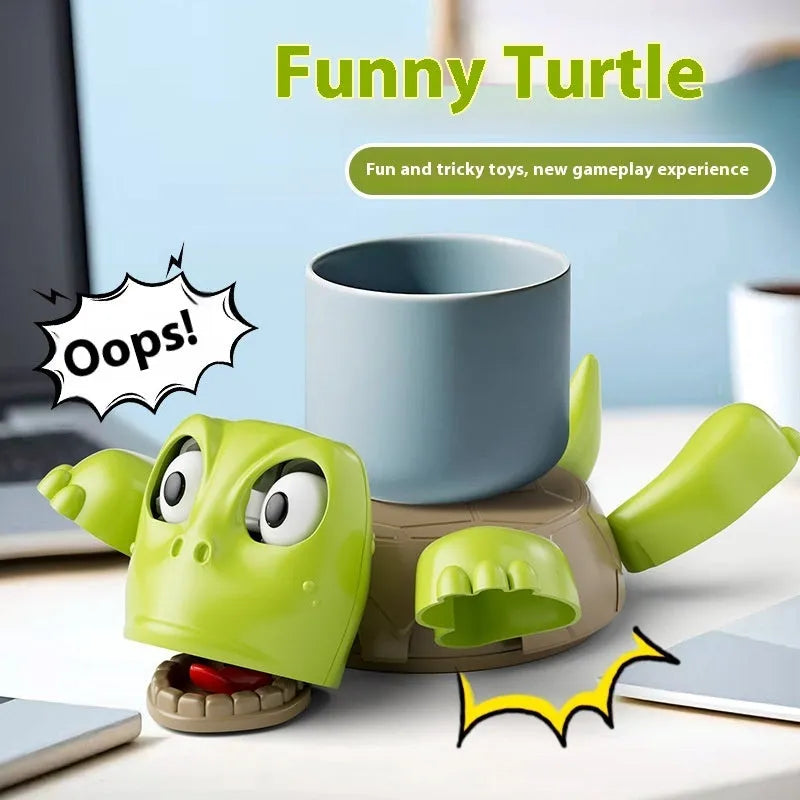 ABS plastic turtle coaster in green shape on desk with a glass of water nearby