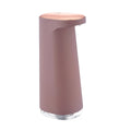White automatic foam soap dispenser with infrared sensor for touch-free operation on a bathroom counter.